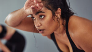 What It Means When You Start Sweating Quickly After Beginning A Workout - Health Digest