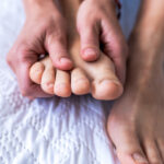 Using Magnesium Oil On Your Feet Before Bed Can Help With Sleep, Stress, And Sore Muscles - Health Digest
